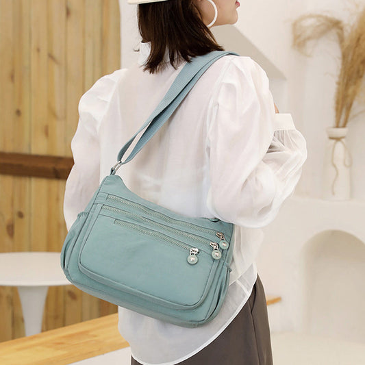 🎒 Könnyű, többzsebű nylon válltáska